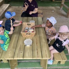 Playtime in Tiny Tree Leeds nursery outdoor area